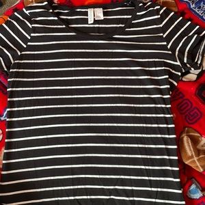 This is a black and white striped “divided” shirt that I loved